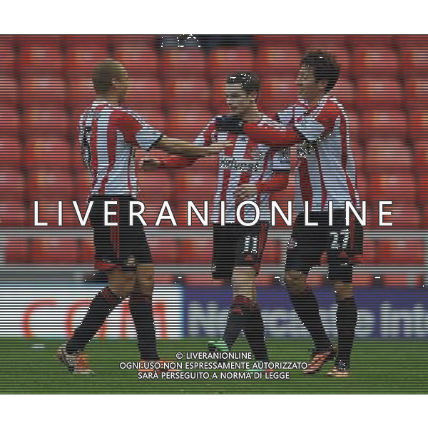 ADAM JOHNSON CELEBRATES GOAL WITH WES BROWN \' JI DONG-WON SUNDERLAND FC V CARLISLE UTD FC SUNDERLAND FC V CARLISLE UTD FC, FA CUP 3RD ROUND STADIUM OF LIGHT, SUNDERLAND, ENGLAND 05 January 2014 GAT77292 BARCLAYS PREMIER LEAGUE 05/01/14 WARNING! This Photograph May Only Be Used For Newspaper And/Or Magazine Editorial Purposes. May Not Be Used For Publications Involving 1 player, 1 Club Or 1 Competition Without Written Authorisation From Football DataCo Ltd. For Any Queries, Please Contact Football DataCo Ltd on +44 (0) 207 864 9121
