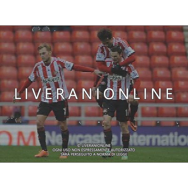ADAM JOHNSON CELEBRATES GOAL WITH JI DONG-WON SUNDERLAND FC V CARLISLE UTD FC SUNDERLAND FC V CARLISLE UTD FC, FA CUP 3RD ROUND STADIUM OF LIGHT, SUNDERLAND, ENGLAND 05 January 2014 GAT77290 BARCLAYS PREMIER LEAGUE 05/01/14 WARNING! This Photograph May Only Be Used For Newspaper And/Or Magazine Editorial Purposes. May Not Be Used For Publications Involving 1 player, 1 Club Or 1 Competition Without Written Authorisation From Football DataCo Ltd. For Any Queries, Please Contact Football DataCo Ltd on +44 (0) 207 864 9121