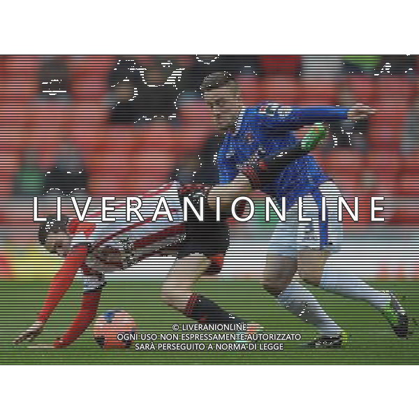 ADAM JOHNSON \' MATTY ROBSON SUNDERLAND FC V CARLISLE UTD FC SUNDERLAND FC V CARLISLE UTD FC, FA CUP 3RD ROUND STADIUM OF LIGHT, SUNDERLAND, ENGLAND 05 January 2014 GAT77288 BARCLAYS PREMIER LEAGUE 05/01/14 WARNING! This Photograph May Only Be Used For Newspaper And/Or Magazine Editorial Purposes. May Not Be Used For Publications Involving 1 player, 1 Club Or 1 Competition Without Written Authorisation From Football DataCo Ltd. For Any Queries, Please Contact Football DataCo Ltd on +44 (0) 207 864 9121