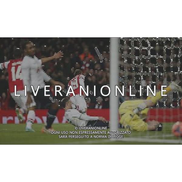 (140105) -- LONDON, Jan. 5, 2014 () -- Santi Cazorla (C) of Arsenal celebrates scoring during FA Cup Third Round match between Arsenal and Tottenham Hotspur at Emirates Stadium in London, Britain on Jan. 4, 2014. Arsenal won 2-0. (/Wang Lili) FOR EDITORIAL USE ONLY. NOT FOR SALE FOR MARKETING OR ADVERTISING CAMPAIGNS. NO USE WITH UNAUTHORIZED AUDIO, VIDEO, DATA, FIXTURE LISTS, CLUBLEAGUE LOGOS OR LIVE SERVICES. ONLINE IN-MATCH USE LIMITED TO 45 IMAGES, NO VIDEO EMULATION. NO USE IN BETTING, GAMES OR SINGLE CLUBLEAGUEPLAYER PUBLICATIONS. AG ALDO LIVERANI SAS ONLY ITALY