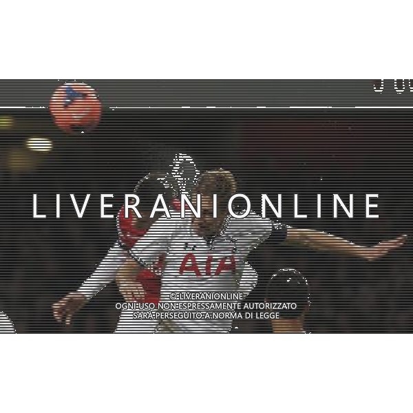 (140105) -- LONDON, Jan. 5, 2014 () -- Laurent Koscielny (L) of Arsenal heads the ball with Michael Dawson of Tottenham Hotspur during FA Cup Third Round match between Arsenal and Tottenham Hotspur at Emirates Stadium in London, Britain on Jan. 4, 2014. Arsenal won 2-0. (/Wang Lili) FOR EDITORIAL USE ONLY. NOT FOR SALE FOR MARKETING OR ADVERTISING CAMPAIGNS. NO USE WITH UNAUTHORIZED AUDIO, VIDEO, DATA, FIXTURE LISTS, CLUBLEAGUE LOGOS OR LIVE SERVICES. ONLINE IN-MATCH USE LIMITED TO 45 IMAGES, NO VIDEO EMULATION. NO USE IN BETTING, GAMES OR SINGLE CLUBLEAGUEPLAYER PUBLICATIONS. AG ALDO LIVERANI SAS ONLY ITALY