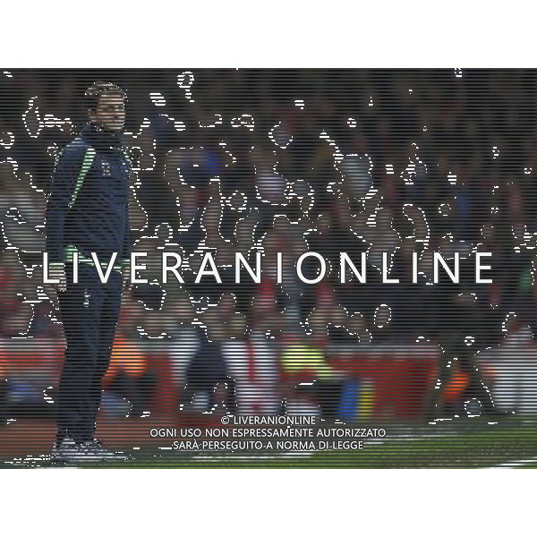 (140105) -- LONDON, Jan. 5, 2014 () -- Tim Sherwood, manager of Tottenham Hotspur, looks on during FA Cup Third Round match between Arsenal and Tottenham Hotspur at Emirates Stadium in London, Britain on Jan. 4, 2014. Arsenal won 2-0. (/Wang Lili) FOR EDITORIAL USE ONLY. NOT FOR SALE FOR MARKETING OR ADVERTISING CAMPAIGNS. NO USE WITH UNAUTHORIZED AUDIO, VIDEO, DATA, FIXTURE LISTS, CLUBLEAGUE LOGOS OR LIVE SERVICES. ONLINE IN-MATCH USE LIMITED TO 45 IMAGES, NO VIDEO EMULATION. NO USE IN BETTING, GAMES OR SINGLE CLUBLEAGUEPLAYER PUBLICATIONS. AG ALDO LIVERANI SAS ONLY ITALY