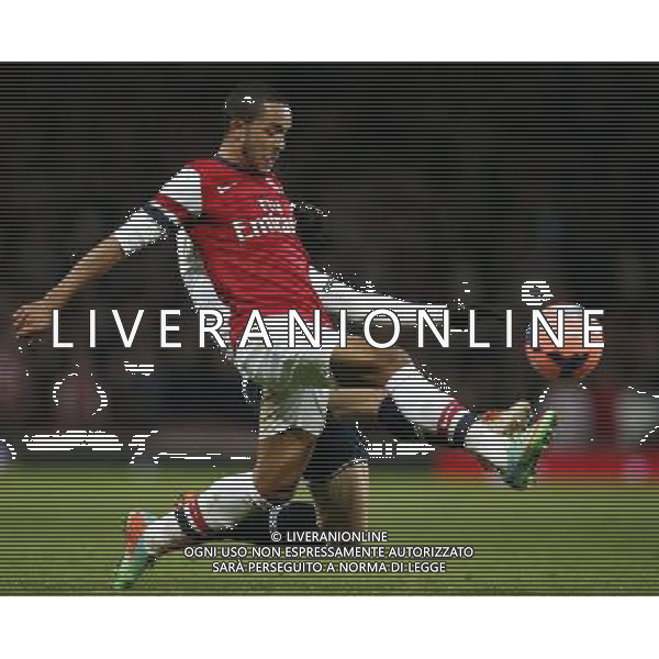 (140105) -- LONDON, Jan. 5, 2014 () -- Theo Walcott (front) of Arsenal vies with Vlad Chiriches of Tottenham Hotspur during FA Cup Third Round match between Arsenal and Tottenham Hotspur at Emirates Stadium in London, Britain on Jan. 4, 2014. Arsenal won 2-0. (/Wang Lili) FOR EDITORIAL USE ONLY. NOT FOR SALE FOR MARKETING OR ADVERTISING CAMPAIGNS. NO USE WITH UNAUTHORIZED AUDIO, VIDEO, DATA, FIXTURE LISTS, CLUBLEAGUE LOGOS OR LIVE SERVICES. ONLINE IN-MATCH USE LIMITED TO 45 IMAGES, NO VIDEO EMULATION. NO USE IN BETTING, GAMES OR SINGLE CLUBLEAGUEPLAYER PUBLICATIONS. AG ALDO LIVERANI SAS ONLY ITALY
