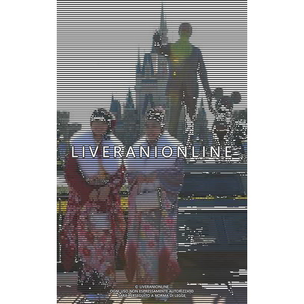 (140113) -- TOKYO, Jan. 13, 2014 () -- Young girls dressed in traditional kimonos pose for photos during the annual Coming-of-Age Day ceremony at the Tokyo Disneyland in Urayasu, suburban Tokyo, Japan, Jan. 13, 2014. People who turned 20-year-old take part in the annual Coming-of-Age Day ceremony on the second Monday of January in Japan.(/Stringer) ©PHOTOHSOT/AGENZIA ALDO LIVERANI SAS - ITALY ONLY - EDITORIAL USE ONLY - Giovani ragazze vestite in kimono tradizionali che hanno compiuto 20 anni prendono parte alla cerimonia annuale Coming-of-Age Day in Giappone, 13 gennaio 2014
