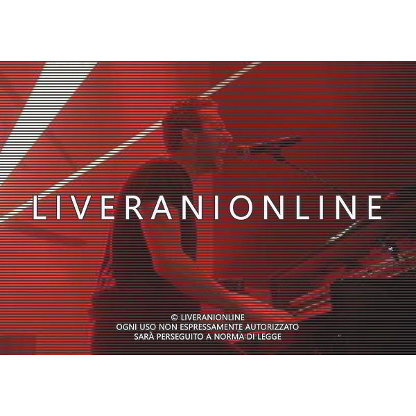  Coldplay on stage at the \'Under 1 Roof\' concert, held at Hammersmith Apollo, London, on Thursday December 19, 2013. AG ALDO LIVERANI SAS ONLY ITALY