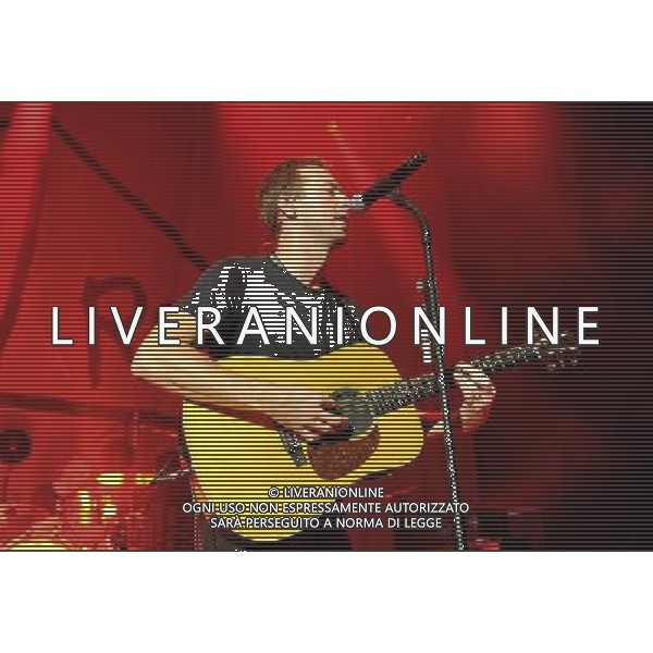  Coldplay on stage at the \'Under 1 Roof\' concert, held at Hammersmith Apollo, London, on Thursday December 19, 2013. AG ALDO LIVERANI SAS ONLY ITALY