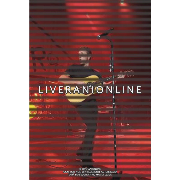  Coldplay on stage at the \'Under 1 Roof\' concert, held at Hammersmith Apollo, London, on Thursday December 19, 2013. AG ALDO LIVERANI SAS ONLY ITALY