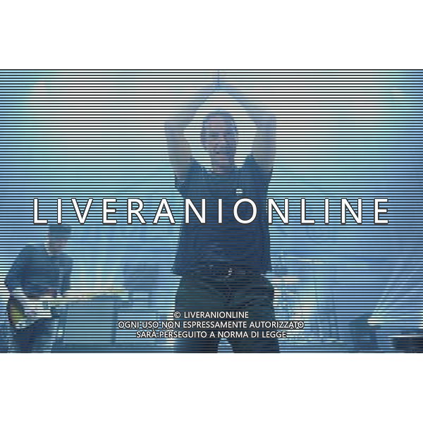  Coldplay on stage at the \'Under 1 Roof\' concert, held at Hammersmith Apollo, London, on Thursday December 19, 2013. AG ALDO LIVERANI SAS ONLY ITALY