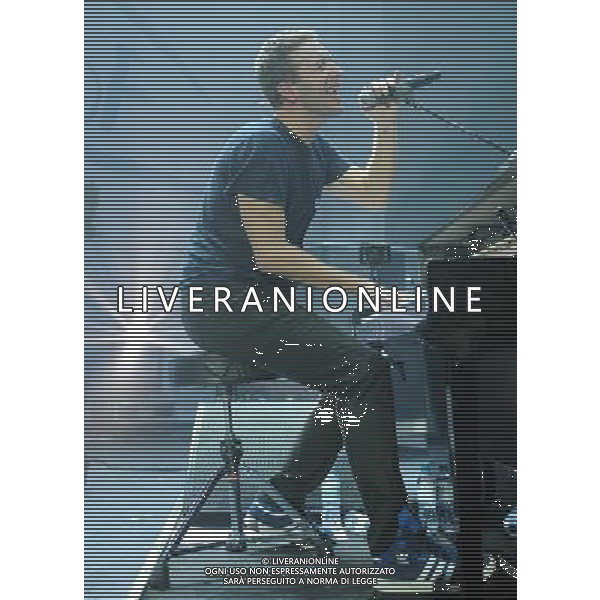 Coldplay on stage at the \'Under 1 Roof\' concert, held at Hammersmith Apollo, London, on Thursday December 19, 2013. AG ALDO LIVERANI SAS ONLY ITALY