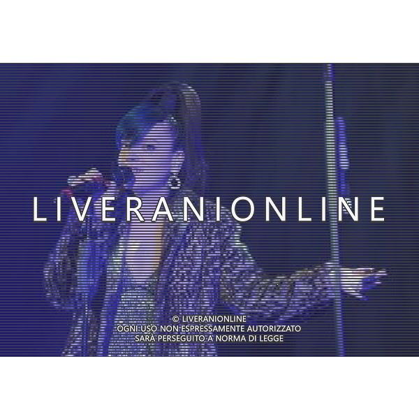  Lily Allen on stage at the \'Under 1 Roof\' concert, held at Hammersmith Apollo, London, on Thursday December 19, 2013. AG ALDO LIVERANI SAS ONLY ITALY