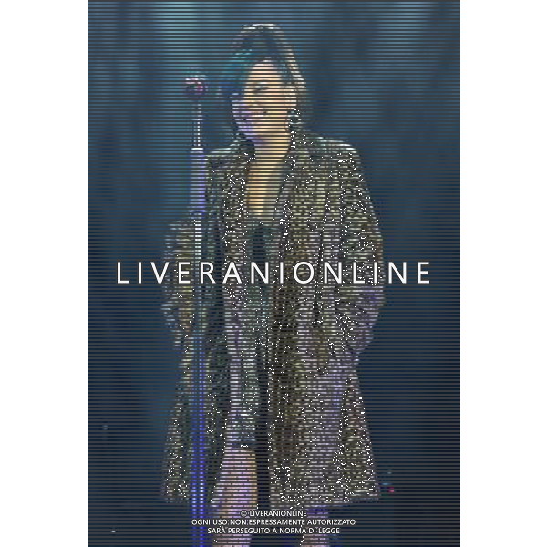  Lily Allen on stage at the \'Under 1 Roof\' concert, held at Hammersmith Apollo, London, on Thursday December 19, 2013. AG ALDO LIVERANI SAS ONLY ITALY
