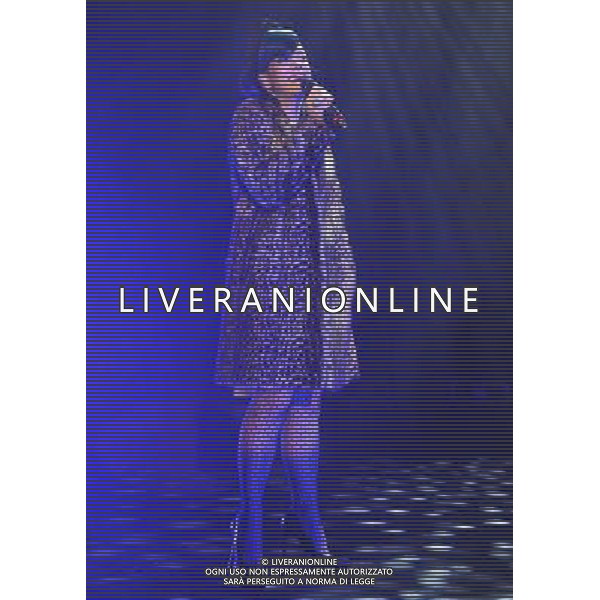  Lily Allen on stage at the \'Under 1 Roof\' concert, held at Hammersmith Apollo, London, on Thursday December 19, 2013. AG ALDO LIVERANI SAS ONLY ITALY
