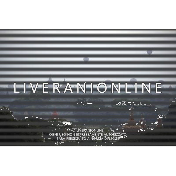 (140116) -- BAGAN, Jan. 16, 2014 () -- Temples are seen at the ancient city of Bagan in Mandalay region, Myanmar, Jan. 15, 2014. Bagan, which stood as an ancient capital from 11th to 13th centuries and Buddhist center with about 10,000 pagodas and religious structures spreading more than 80 square-kilometers, now remains with over 2,000 ruins. (/U Aung)(ctt) ©photoshot/AGENZIA ALDO LIVERANI SAS - ITALY ONLY - Veduta dei templi nelll\'antica citta\' di Bagan nella regione di Mandalay, Myanmar, 15 gennaio 2014.