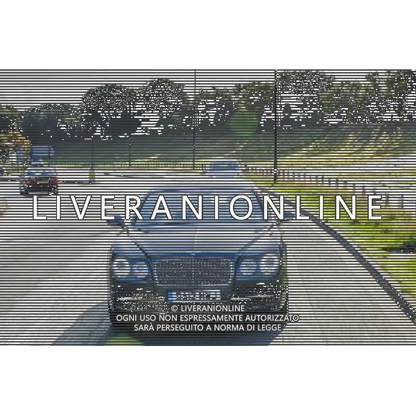 The BEntley Continental Flying Spur seen driving on the public road that has been made out of the old banked Brooklands racing circuit. Bentley Flying Spur /Ag. Aldo Liverani s.a.s.-Only Italy-Editorial Use Only