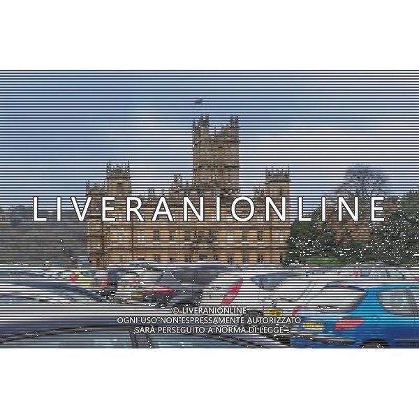 The lawn in front of Highclere Castle seen packed with visitos\' cars. It is the location for the Summer fete scene in the television series. Downton Abbey open day ©Photoshot/Ag. Aldo Liverani s.a.s.-Only Italy-Editorial Use Only