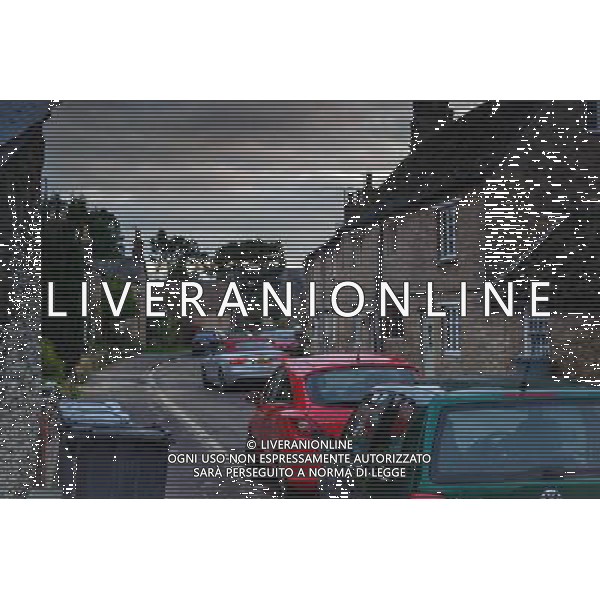 The village of Bampton seen as it appears in real life. Modern cars prove the village is part of the present century and not a relic of the past. Downton Abbey open day ©Photoshot/Ag. Aldo Liverani s.a.s.-Only Italy-Editorial Use Only