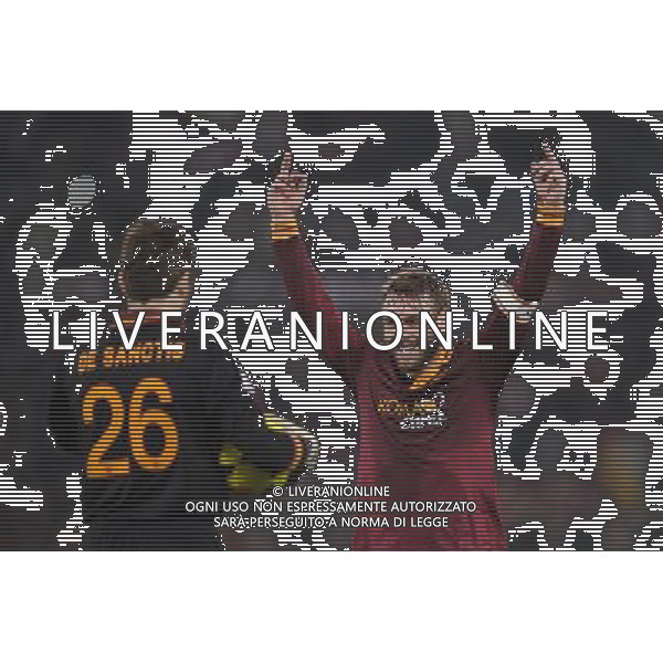 Roma - 21/01/2014 - Stadio Olimpico - TIM CUP 2013-2014 - Quarti di finale - Roma vs Juventus - nella foto: de rossi esulta verso i tifosi della juventus / Ph. Fabrizio Corradetti - Ag. Aldo Liverani sas