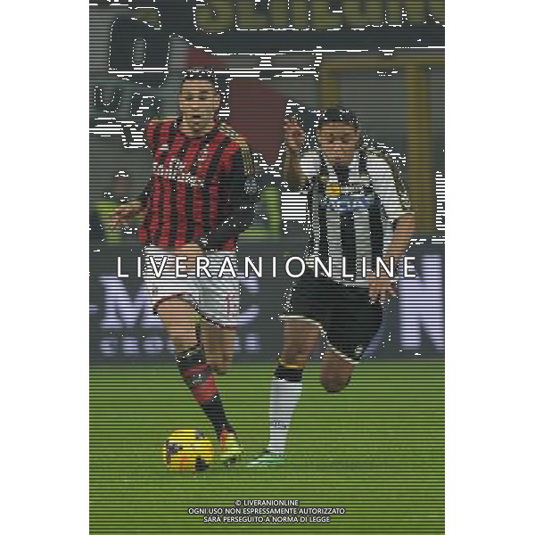 Milano 22-01-2014 TIM Cup - Coppa Italia quarti di finale Stadio Giuseppe Meazza - San Siro Milan - Udinese nella foto Adil Rami (Milan) e a DX Luis Fernando Muriel (Udinese) foto Roberto Garavaglia - ag. Aldo Liverani sas