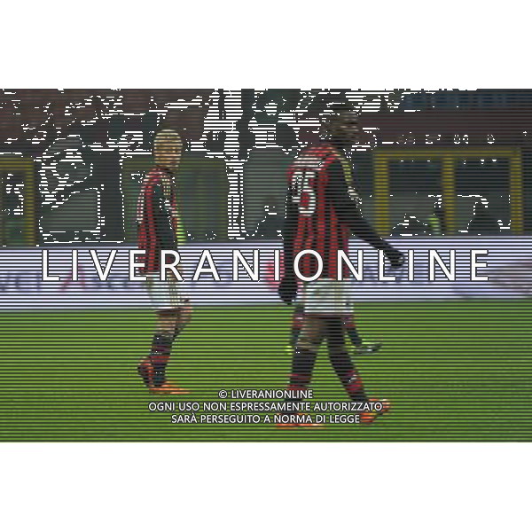 Milano 22-01-2014 TIM Cup - Coppa Italia quarti di finale Stadio Giuseppe Meazza - San Siro Milan - Udinese nella foto Keisuke Honda (Milan) a SX e Mario Balotelli (Milan) foto Roberto Garavaglia - ag. Aldo Liverani sas