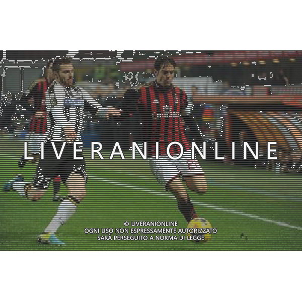 Milano 22-01-2014 TIM Cup - Coppa Italia quarti di finale Stadio Giuseppe Meazza - San Siro Milan - Udinese nella foto Ricardo Kaka\' (Milan) e a SX Thomas Heurtaux (Udinese) foto Roberto Garavaglia - ag. Aldo Liverani sas