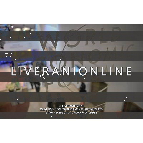 DAVOS/SWITZERLAND, 22JAN14 - The logo of the World Economic Forum is seen in the congress centre during the Annual Meeting 2014 of the World Economic Forum in Davos, January 22, 2014. WORLD ECONOMIC FORUM/swiss-image.ch/Photo Urs Jaudas Â©Photoshot/Ag. Aldo Liverani s.a.s.-Only Italy-Editorial Use Only