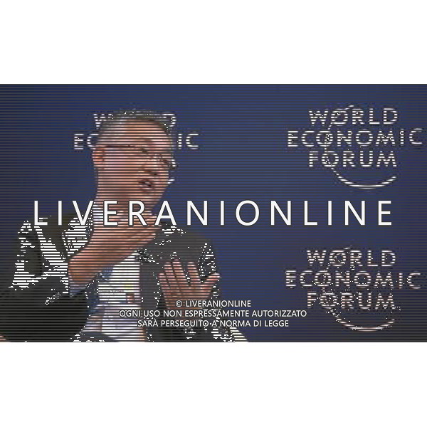 DAVOS/SWITZERLAND, 22JAN14 - Zhang Yichen, Chairman and Chief Executive Officer, CITIC Capital, Hong Kong SAR gestures during the session \'The China Context\' at the Annual Meeting 2014 of the World Economic Forum at the congress centre in Davos, January 22, 2014. WORLD ECONOMIC FORUM/swiss-image.ch/Photo Nicola Pitaro Â©Photoshot/Ag. Aldo Liverani s.a.s.-Only Italy-Editorial Use Only