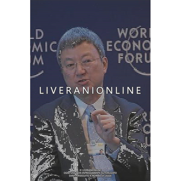 DAVOS/SWITZERLAND, 22JAN14 - Min Zhu, Deputy Managing Director, International Monetary Fund (IMF), Washington DC; World Economic Forum Foundation Board Member makes a point during the session \'Getting Back to Natural Growth\' at the Annual Meeting 2014 of the World Economic Forum at the congress centre in Davos, January 22, 2014. WORLD ECONOMIC FORUM/swiss-image.ch/Photo Moritz Hager Â©Photoshot/Ag. Aldo Liverani s.a.s.-Only Italy-Editorial Use Only