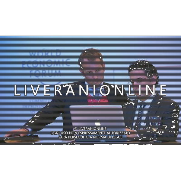DAVOS/SWITZERLAND, 21JAN14 - Working participants. Feature of the Annual Meeting 2014 of the World Economic Forum at the congress centre in Davos, January 21, 2014. WORLD ECONOMIC FORUM/swiss-image.ch/Photo RÃ©my Steinegger Â©Photoshot/Ag. Aldo Liverani s.a.s.-Only Italy-Editorial Use Only