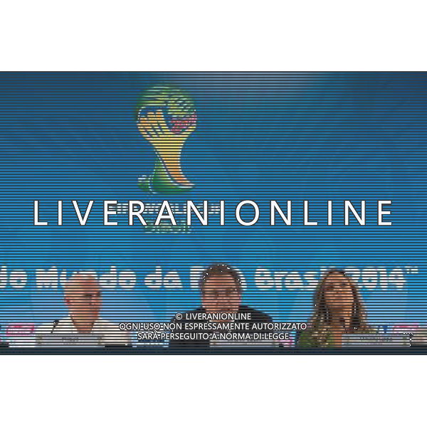 (140124) -- RIO DE JANEIRO, Jan. 24, 2014 () -- FIFA Secretary General Jerome Valcke (C), U.S. singer Pitbull (L) and Brazilian singer Claudia Leitte attend a press conference after a regular meeting of FIFA Local Organizing Comittee (LOC) in Rio de Janeiro, Brazil, Jan. 23, 2014. FIFA LOC announced here on Thursday that U.S. pop singers Jennifer Lopez, Pitbull and Brazilian singer Claudia Leitte will jointly sing the official theme song \'We Are One\' for the 2014 FIFA World Cup. (/Xu Zijian) ©Photoshot/Ag. Aldo Liverani s.a.s.-Only Italy-Editorial Use Only