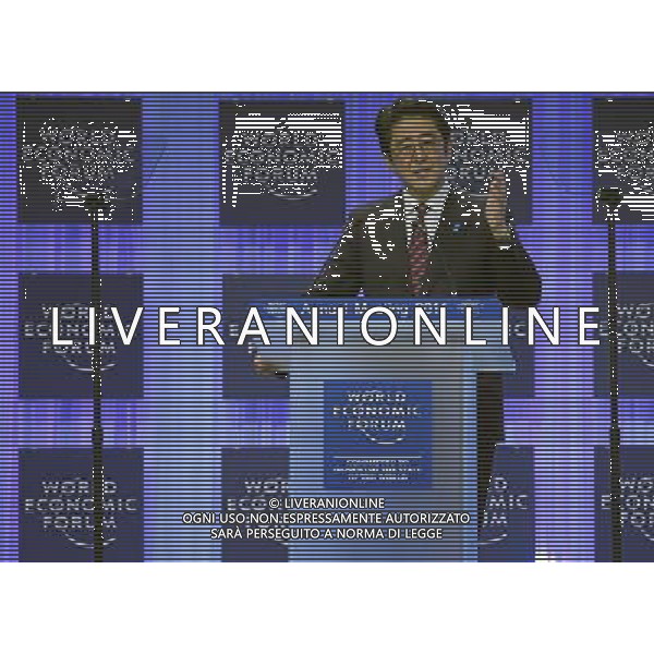 Shinzo Abe, Prime Minister of Japan speaks during the session \'The Reshaping of the World: Vision from Japan\' at the Annual Meeting 2014 of the World Economic Forum at the congress centre in Davos, January 22, 2014. WORLD ECONOMIC FORUM/swiss-image.ch/Photo RÈmy Steinegger ©Photoshot/Ag. Aldo Liverani s.a.s.-Only Italy-Editorial Use Only