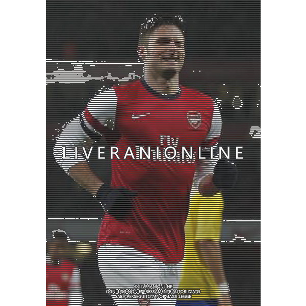 (140125) -- LONDON, Jan. 25, 2014 () -- Olivier Giroud of Arsenal celebrates scoring during FA Cup Fourth Round match between Arsenal and Coventry City at Emirates Stadium in London, Britain on Jan. 24, 2014. Arsenal won 4-0. (/Wang Lili) FOR EDITORIAL USE ONLY. NOT FOR SALE FOR MARKETING OR ADVERTISING CAMPAIGNS. NO USE WITH UNAUTHORIZED AUDIO, VIDEO, DATA, FIXTURE LISTS, CLUBLEAGUE LOGOS OR LIVE SERVICES. ONLINE IN-MATCH USE LIMITED TO 45 IMAGES, NO VIDEO EMULATION. NO USE IN BETTING, GAMES OR SINGLE CLUBLEAGUEPLAYER PUBLICATIONS. AG ALDO LIVERANI SAS ONLY ITALY