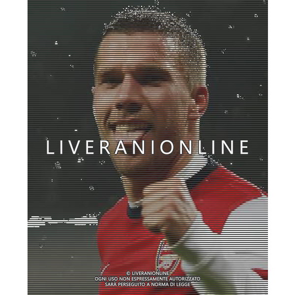 (140125) -- LONDON, Jan. 25, 2014 () -- Lukas Podolski of Arsenal celebrates scoring his second goal during FA Cup Fourth Round match between Arsenal and Coventry City at Emirates Stadium in London, Britain on Jan. 24, 2014. Arsenal won 4-0. (/Wang Lili) FOR EDITORIAL USE ONLY. NOT FOR SALE FOR MARKETING OR ADVERTISING CAMPAIGNS. NO USE WITH UNAUTHORIZED AUDIO, VIDEO, DATA, FIXTURE LISTS, CLUBLEAGUE LOGOS OR LIVE SERVICES. ONLINE IN-MATCH USE LIMITED TO 45 IMAGES, NO VIDEO EMULATION. NO USE IN BETTING, GAMES OR SINGLE CLUBLEAGUEPLAYER PUBLICATIONS. AG ALDO LIVERANI SAS ONLY ITALY