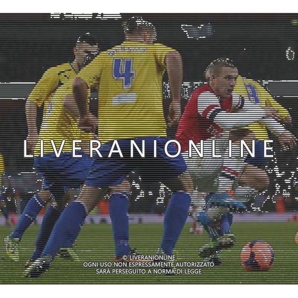 (140125) -- LONDON, Jan. 25, 2014 () -- Lukas Podolski(1st,R) of Arsenal vies with players of Coventry City during FA Cup Fourth Round match between Arsenal and Coventry City at Emirates Stadium in London, Britain on Jan. 24, 2014. Arsenal won 4-0. (/Wang Lili) FOR EDITORIAL USE ONLY. NOT FOR SALE FOR MARKETING OR ADVERTISING CAMPAIGNS. NO USE WITH UNAUTHORIZED AUDIO, VIDEO, DATA, FIXTURE LISTS, CLUBLEAGUE LOGOS OR LIVE SERVICES. ONLINE IN-MATCH USE LIMITED TO 45 IMAGES, NO VIDEO EMULATION. NO USE IN BETTING, GAMES OR SINGLE CLUBLEAGUEPLAYER PUBLICATIONS. AG ALDO LIVERANI SAS ONLY ITALY