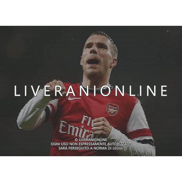 (140125) -- LONDON, Jan. 25, 2014 () -- Lukas Podolski of Arsenal celebrates scoring his second goal during FA Cup Fourth Round match between Arsenal and Coventry City at Emirates Stadium in London, Britain on Jan. 24, 2014. Arsenal won 4-0. (/Wang Lili) FOR EDITORIAL USE ONLY. NOT FOR SALE FOR MARKETING OR ADVERTISING CAMPAIGNS. NO USE WITH UNAUTHORIZED AUDIO, VIDEO, DATA, FIXTURE LISTS, CLUBLEAGUE LOGOS OR LIVE SERVICES. ONLINE IN-MATCH USE LIMITED TO 45 IMAGES, NO VIDEO EMULATION. NO USE IN BETTING, GAMES OR SINGLE CLUBLEAGUEPLAYER PUBLICATIONS. AG ALDO LIVERANI SAS ONLY ITALY