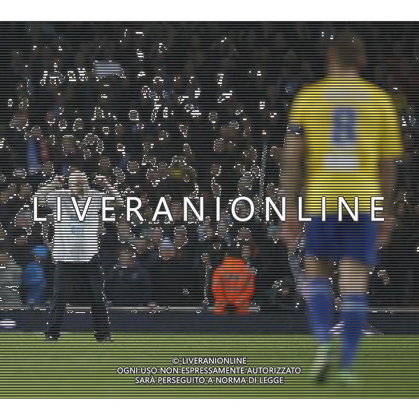 (140125) -- LONDON, Jan. 25, 2014 () -- A fan of Coventry City invading the pitch gestures during FA Cup Fourth Round match between Arsenal and Coventry City at Emirates Stadium in London, Britain on Jan. 24, 2014. Coventry City lost 0-4 . (/Wang Lili) FOR EDITORIAL USE ONLY. NOT FOR SALE FOR MARKETING OR ADVERTISING CAMPAIGNS. NO USE WITH UNAUTHORIZED AUDIO, VIDEO, DATA, FIXTURE LISTS, CLUBLEAGUE LOGOS OR LIVE SERVICES. ONLINE IN-MATCH USE LIMITED TO 45 IMAGES, NO VIDEO EMULATION. NO USE IN BETTING, GAMES OR SINGLE CLUBLEAGUEPLAYER PUBLICATIONS. AG ALDO LIVERANI SAS ONLY ITALY