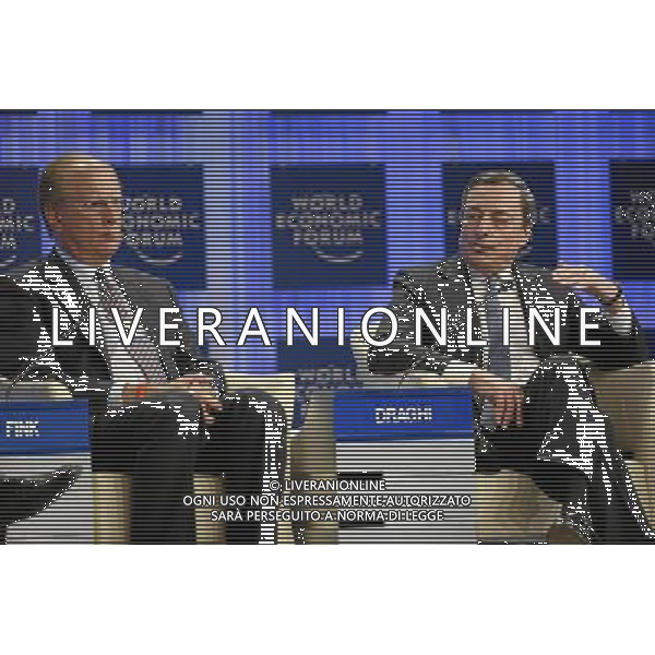 Laurence Fink, Chairman and Chief Executive Officer, BlackRock, USA is listens the speech of Mario Draghi, President, European Central Bank, Frankfurt during the session \'Global Economic Outlook 2014\' at the Annual Meeting 2014 of the World Economic Forum at the congress centre in Davos, January 25, 2014. WORLD ECONOMIC FORUM/swiss-image.ch/Photo Jolanda Flubacher AG ALDO LIVERANI SAS ONLY ITALY