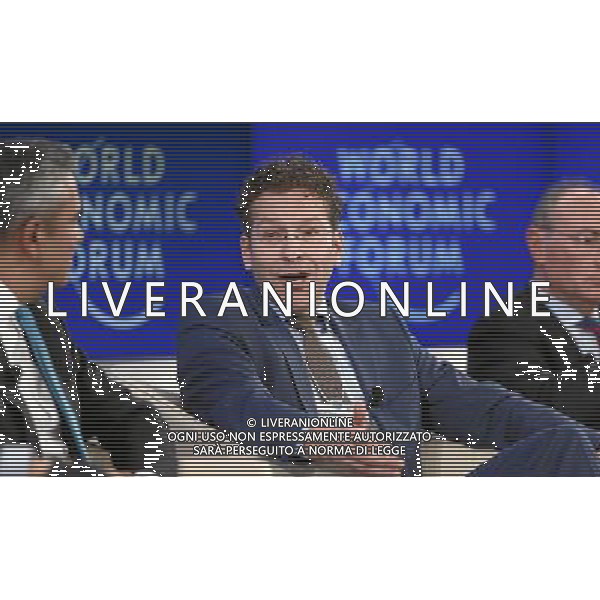 Anshu Jain (L), Co-Chief Executive Officer, Deutsche Bank, Germany and Co-Chair of the Governors for Financial Services for 2014 listens and Jeroen Dijsselbloem (C), President of the Euro Group; Minister of Finance of the Netherlands speaks during the session \'Rebuilding Banking in Europe\' at the Annual Meeting 2014 of the World Economic Forum at the congress centre in Davos, January 25, 2014. WORLD ECONOMIC FORUM/swiss-image.ch/Photo Moritz Hager AG ALDO LIVERANI SAS ONLY ITALY