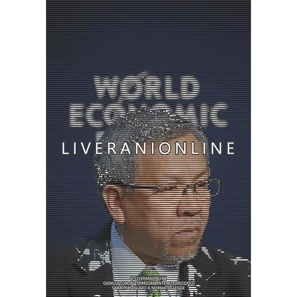 Gregory L. Domingo, Secretary of Trade and Industry of the Philippines; Special Envoy of the President to the World Economic Forum Annual Meeting concentrates during the session \'Building Resilience to Natural Disasters\' at the Annual Meeting 2014 of the World Economic Forum at the congress centre in Davos, January 25, 2014. WORLD ECONOMIC FORUM/swiss-image.ch/Photo Remy Steinegger AG ALDO LIVERANI SAS ONLY ITALY