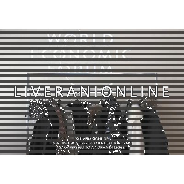 Impression of coats on a rack in the congress centre during the Annual Meeting 2014 of the World Economic Forum in Davos, January 25, 2014. WORLD ECONOMIC FORUM/swiss-image.ch/Photo Moritz Hager AG ALDO LIVERANI SAS ONLY ITALY