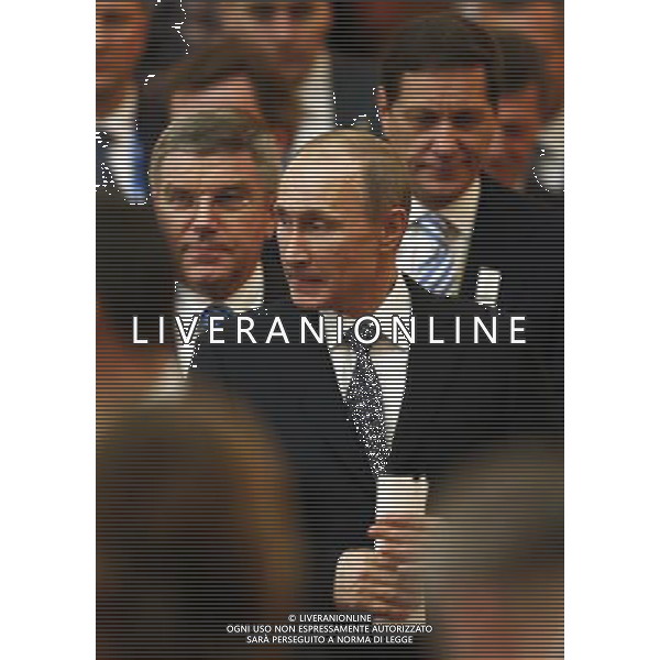 (140204) -- SOCHI, Feb. 4, 2014 () -- Russian President Vladimir Putin (C) arrives for the opening ceremony of the 126th IOC Session at the Zimny Theatre in Sochi, Russia on Feb. 4, 2014. The 3-day 126th IOC Session opened on Tuesday three days ahead of the official start of the Sochi 2014 Olympic Winter Games. (/Wang Lili) ©PHOTOSHOT/AGENZIA ALDO LIVERANI SAS - ITALY ONLY - Preparativi in occasione della cerimonia di apertura delle Olimpiadi invernali del 2014, che avranno inizio il 7 febbraio a Sochi, in Russia, 4 Febbraio 2014.