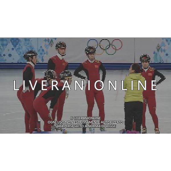 (140206) -- SOCHI, Feb. 6, 2014 () -- China\'s short track speed skating team listen to coach Li Yan (R2) during a training ahead of the Sochi 2014 Olympic Winter Games in Sochi, Feb. 6, 2014. (/Wang Haofei) ©photoshot/AGENZIA ALDO LIVERANI SAS - ITALY ONLY - 22mi Giochi Olimpici Invernali Olimpiadi di Sochi, Russia 6 febbraio 2014