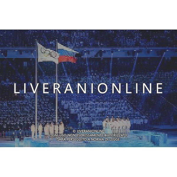 07.02.2014, Olympiastadion Fischt, Adler, RUS, Sochi 2014, ErÃ¶ffnungsfeier der XXII. Olympischen Winterspiele, im Bild die Olympische und Russische Fahne wehen im Stadion // the Olympic and Russian flag waving in the stadium during the Opening Ceremony of the Olympic Winter Games Sochi 2014 at the Fisht Olympic Stadium in Adler, Russia on 2014/02/07. EXPA Pictures Â© 2014, PhotoCredit: EXPA/ Johann Groder Â©PHOTOSHOT/AGENZIA ALDO LIVERANI SAS - ITALY ONLY - Cerimonia di apertura dei 22mi Giochi Olimpici Invernali Olimpiadi di Sochi, Russia 7 febbraio 2014