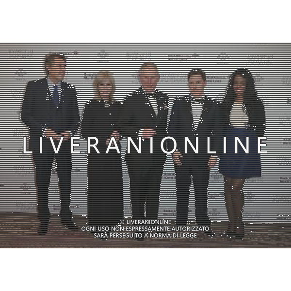 Prince Charles, Prince of Wales (2R) poses with (from L-R) singer Bryan Ferry, actress Joanna Lumley, Rob Brydon and Prince\'s Trust Young Ambassador Naima Swaleh at a reception for the Prince\'s Trust Invest in Futures Gala Dinner at The Savoy Hotel on February 6, 2014 in London, England. The money raised by the event will help disadvantaged young people into jobs. ©photoshot/AGENZIA ALDO LIVERANI SAS - ITALY ONLY - REALI INGLESI: Il Principe Carlo d\'inghilterra a un ricevimento e Cena di Gala al The Savoy Hotel il 6 febbraio 2014 a Londra per una raccolta di fondi per aiutare i giovani svantaggiati nel mondo del lavoro.