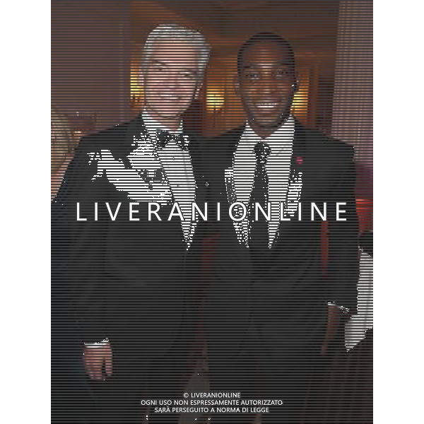 Phillip Schofield and Tinie Tempah pose at a reception for the Prince\'s Trust Invest in Futures Gala Dinner at The Savoy Hotel on February 6, 2014 in London, England. The money raised by the event will help disadvantaged young people into jobs. ©photoshot/AGENZIA ALDO LIVERANI SAS - ITALY ONLY - REALI INGLESI: Il Principe Carlo d\'inghilterra a un ricevimento e Cena di Gala al The Savoy Hotel il 6 febbraio 2014 a Londra per una raccolta di fondi per aiutare i giovani svantaggiati nel mondo del lavoro.