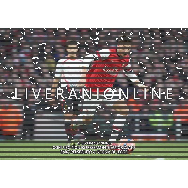 Arsenal\'s Mesut Ozil in action Photo by Kieran Galvin/CameraSport Football - FA Challenge Cup Fifth Round - Arsenal v Liverpool - Sunday 16th February 2014 - Emirates Stadium - London © CameraSport - 43 Linden Ave. Countesthorpe. Leicester. England. LE8 5PG - Tel: +44 (0) 116 277 4147 - admin@camerasport.com - www.camerasport.com AG ALDO LIVERANI SAS ONLY ITALY