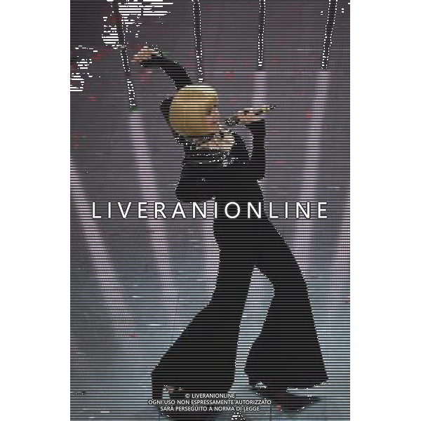 Festival di Sanremo Nella foto: Luciana Littizzetto imita Raffaella Carra\' Prima Serata 64mo Festival della Canzone Italiana di Sanremo 18 febbraio 2014 ©gazzaniga/AGENZIA ALDO LIVERANI SAS