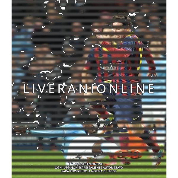 LIONEL MESSI \' YAYA TOURE MANCHESTER CITY V BARCELONA FC MANCHESTER CITY V BARCELONA FC, CHAMPIONS LEAGUE ETIHAD STADIUM, MANCHESTER, ENGLAND 18 February 2014 GAT78684 CHAMPIONS LEAGUE 1ST LEG 18/02/14 WARNING! This Photograph May Only Be Used For Newspaper And/Or Magazine Editorial Purposes. May Not Be Used For Publications Involving 1 player, 1 Club Or 1 Competition Without Written Authorisation From Football DataCo Ltd. For Any Queries, Please Contact Football DataCo Ltd on +44 (0) 207 864 9121 AG ALDO LIVERANI SAS ONLY ITALY