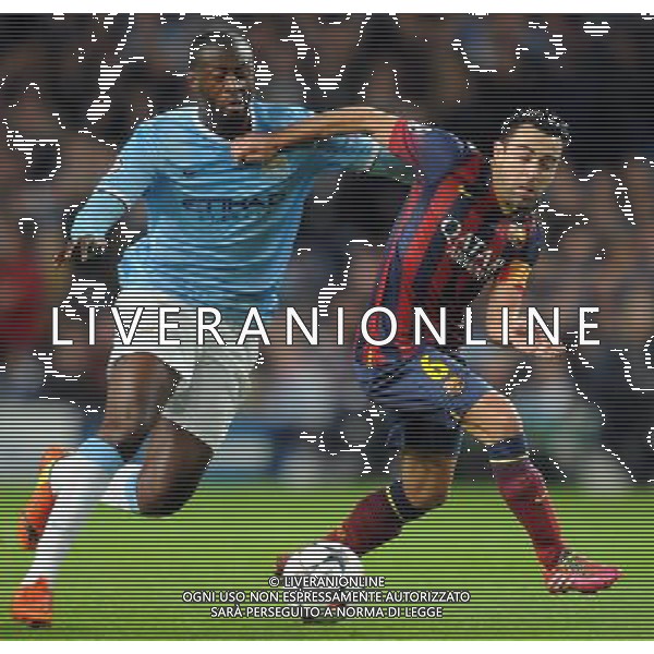YAYA TOURE \' XAVI MANCHESTER CITY V BARCELONA FC MANCHESTER CITY V BARCELONA FC, CHAMPIONS LEAGUE ETIHAD STADIUM, MANCHESTER, ENGLAND 18 February 2014 GAT78728 CHAMPIONS LEAGUE 1ST LEG 18/02/14 WARNING! This Photograph May Only Be Used For Newspaper And/Or Magazine Editorial Purposes. May Not Be Used For Publications Involving 1 player, 1 Club Or 1 Competition Without Written Authorisation From Football DataCo Ltd. For Any Queries, Please Contact Football DataCo Ltd on +44 (0) 207 864 9121 AG ALDO LIVERANI SAS ONLY ITALY