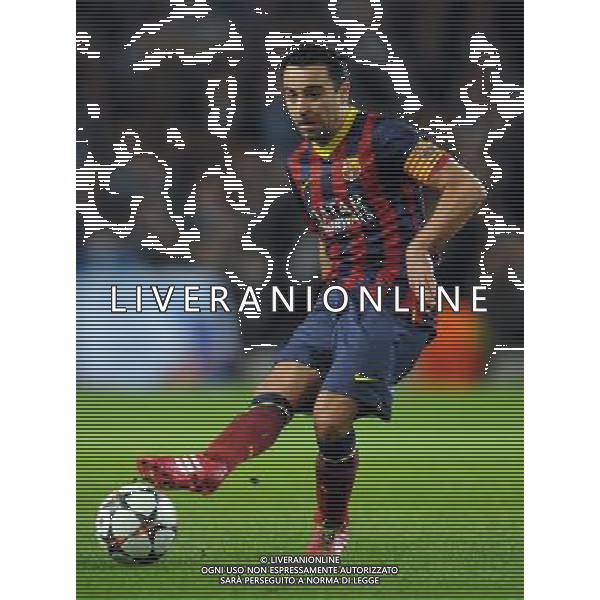 XAVI BARCELONA FC MANCHESTER CITY V BARCELONA FC, CHAMPIONS LEAGUE ETIHAD STADIUM, MANCHESTER, ENGLAND 18 February 2014 GAT78719 MANCHESTER CITY V BARCELONA FC CHAMPIONS LEAGUE 1ST LEG 18/02/14 WARNING! This Photograph May Only Be Used For Newspaper And/Or Magazine Editorial Purposes. May Not Be Used For Publications Involving 1 player, 1 Club Or 1 Competition Without Written Authorisation From Football DataCo Ltd. For Any Queries, Please Contact Football DataCo Ltd on +44 (0) 207 864 9121 AG ALDO LIVERANI SAS ONLY ITALY