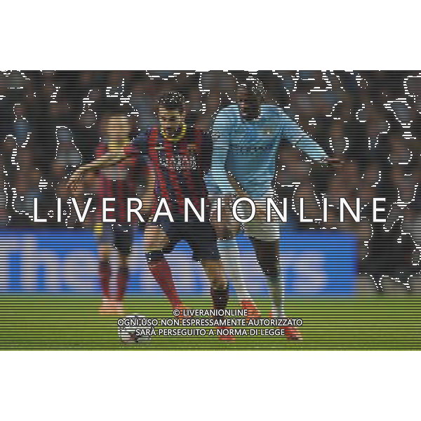 CESC FABREGAS \' YAYA TOURE MANCHESTER CITY V BARCELONA FC MANCHESTER CITY V BARCELONA FC, CHAMPIONS LEAGUE ETIHAD STADIUM, MANCHESTER, ENGLAND 18 February 2014 GAT78714 CHAMPIONS LEAGUE 1ST LEG 18/02/14 WARNING! This Photograph May Only Be Used For Newspaper And/Or Magazine Editorial Purposes. May Not Be Used For Publications Involving 1 player, 1 Club Or 1 Competition Without Written Authorisation From Football DataCo Ltd. For Any Queries, Please Contact Football DataCo Ltd on +44 (0) 207 864 9121 AG ALDO LIVERANI SAS ONLY ITALY